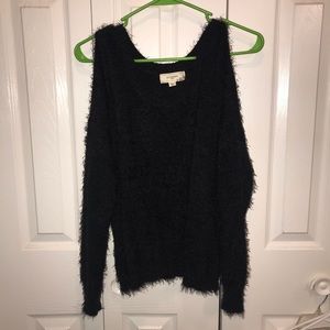 Oversized fuzzy black sweater w shoulder cutout